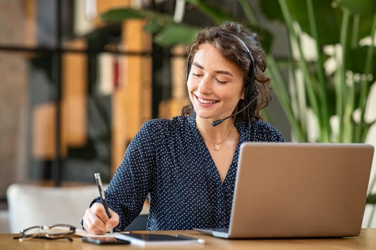 Smiling woman wearing a headset